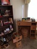 vintage sewing desk with a Singer sewing machine, bookcase, books