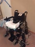 Merit Electric wheel chair and accessories 