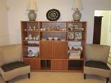 2 Upholstered Side Chairs, Teak Book Shelf/Cabinet, Lamps, Tray with inlaid Mother Of Pearl, and misc items (glass, table cloths, porcelain).