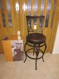 2 swivel bar stools (1 assembled and 1 in the box)