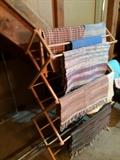 wooden drying rack, throw rugs