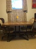Kitchen table with 1 leaf & 4 rolling chairs
