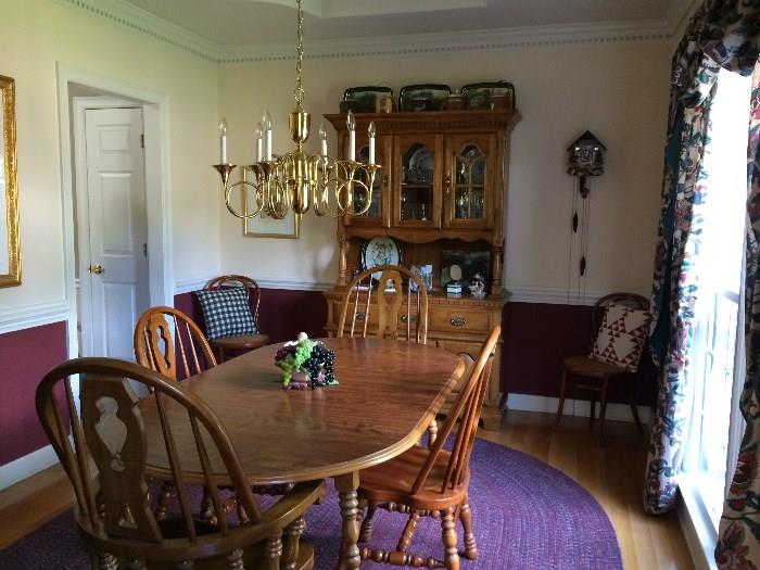 dining room table has leaves (can be made smaller), matching chairs and china cabient, 