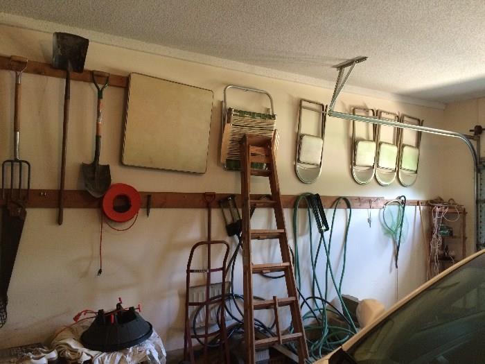 folding chairs, yard tools, ladder and other items