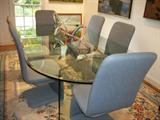 Great solid glass dining table and 6 Carson swival chairs
