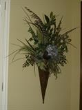 1 of 2 floral arrangements in metal sconces