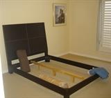 Platform bed with leather headboard