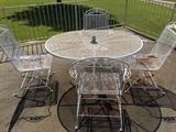 Wrought Iron Table with Four Chairs