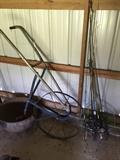 Fishing rods, iron pot and hand plow