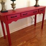 Red Sofa table (Painted Annie Sloan's "Emperor's Silk" with dark wax) The color is off in this picture. It's actually a deep red. Solid cherry piece by Crescent furniture if you would like to refinish.