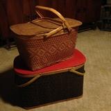 Two vintage picnic baskets.