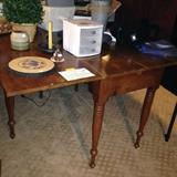 Minnie Pearl's kitchen table! This gate leg primitive table was purchased at her estate sale. One board is missing off one side so this is better against a wall or as a sofa table. Wonderful conversation piece and beautiful wood patina.