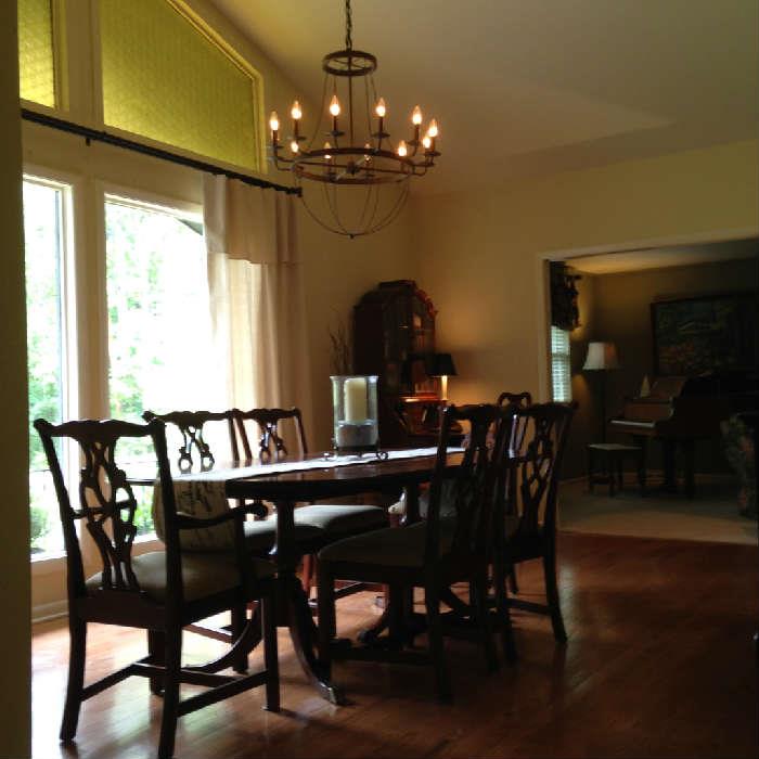 Crescent Furniture solid cherry dining room set. Oval Table with two leaves and protector set. 4 side chairs and 2 arm chairs.