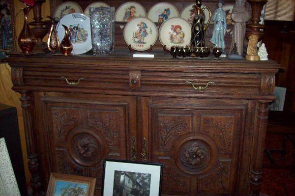 French Renaissance solid oak, hand carved, china cabinet.  Glass doors on top portion of cabinet