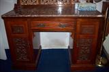 lower portionof walnut desk with marble top