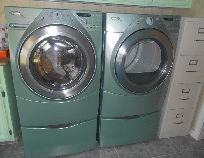 Whirlpool Duet Front Load Washer (Model WED9600TA1) and Dryer (Model WFW9600TAD1) with Pedestals. Serviced and maintained regularly.