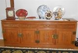 Asian console/buffet Made In Hong Kong. Solid construction with finished back.