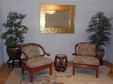 Describing these chairs as classic contemporary with an Asian flair. Solid hardwood construction. Beautiful pots with greenery set on wood oriental fish bowl stands. Framed beveled mirror. Also showing a portion of one of the wool rugs for sale.
