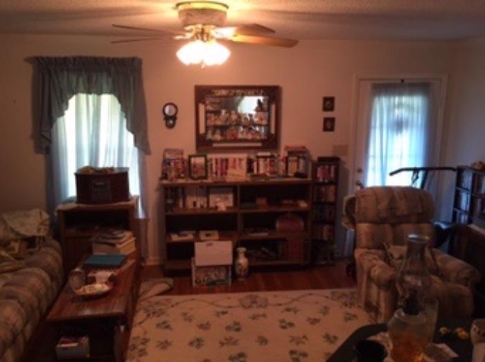 Recliner, old cabinet tv, vintage mirror/shelf, rug