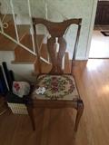 Beautiful wood chair with floral upholstery 