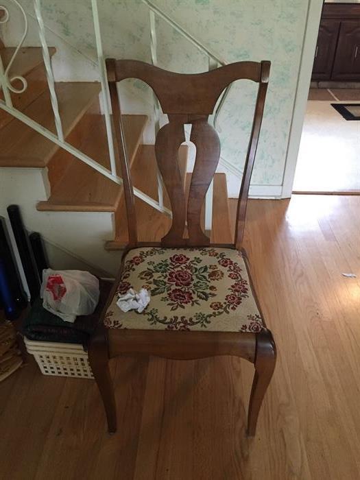 Beautiful wood chair with floral upholstery 