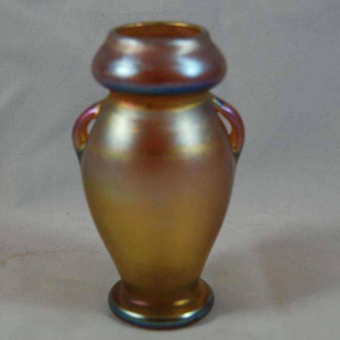 Louis Comfort Tiffany signed Favrile signed vase Numbered 7167D, early twentieth Century
Condition:Very Good
Shipping: Yes
Size: 4 1/4"
Location:K