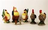 Item Description: A nice collection of vintage rooster and hen figurines including a brightly colored Royal Copley rooster and two hens, a pair made by Homco and a miniature unmarked set. 
