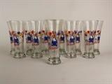 Item Description: A great set of twelve 1987 Anheuser-Bush, Inc. Spuds Mackenzie Bud Light Beer 12 oz. pilsner glasses with full color graphics of the iconic Spuds Mackenzie, sporting a party hat surrounded by balloons with "Bud Light, Spuds Mackenzie, The original party animal" printed on the front. 
