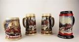 Item Description: A collection of four handsome Budweiser collectable beer steins including two matching steins stamped with "Staffel Stoneware W-Germany" they are decorated with raised relief, 3-D images of the Budweiser Clydesdales with a horse shoe around the image. There is also stein marked on the bottom with "Handcrafted Expressly for Anheuser-Bush, Inc., Budweiser Oktoberfest Third in series" dated 1993 and numbered 23021 and a Christmas stein with " Handcrafted expressly for Anheuser-Bush, Inc. 1992 Collector's series 'A Perfect Christmas" The world famous Budweiser Clydesdales 8-Horse hitch and wagon, rendered by artist Susan Sampson"
