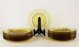 Item Description: A lovely set of sixteen vintage amber colored glass plates.
