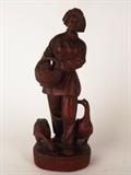 Item Description: A stunning wood carved statue of a Chinese girl feeding two geese from a basket she is carrying. 

