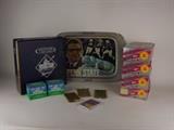 Item Description: A large collection of football cards and more contains four vendor boxes of Pacific 1991 Premier edition NFL Pro Football cards, Two 1989 Score, NFL Football supplemental sets with player cards and magic motion trivia cards, a folder containing individual football trading cards of players such as Tim Tebow, Mike Brim, Eric Metcalf and many more, there is also a Penn State Nittany Lions Coca-Cola metal tray
