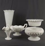 Item Description: A wonderful collection of 5 pieces of vintage hobnail milk glass including a beautiful a pedestal fruit bowl, a tall vase with scalloped edges, a small footed bud vase with a ruffled edge, a footed candle stick holder with a tight ruffled edge and a Kemple Sunburst 2-handled bon bon compote.
