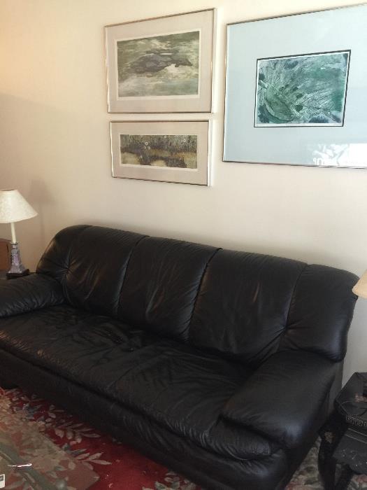 Black leather sofa in excellent condition