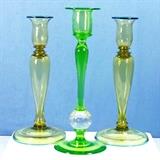 Pairpoint control bubble ball stem creen glass candlestick with pair of related blown glass candlesticks with dome feet and blue rims