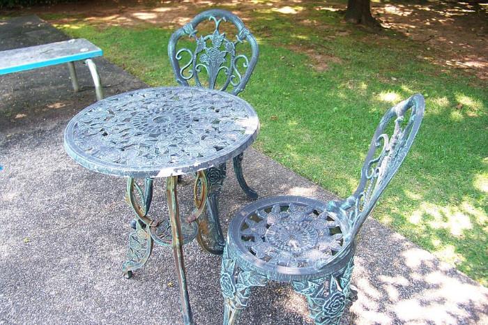 Small metal table and two chairs
