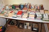 Lots of books and picture frames