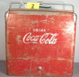 Antique Red Tin Coca-Cola Picnic Cooler Great vintage collectible "Drink Coca Cola" tin ice chest / cooler with original lid and handle bar. Side has built-in bottle opener, does not include any extra parts or trays inside. Paint and surface wear, some dings, scratches and the lid is a bit bent. Made by TempRite Mfg Company Inc. in the USA, would make a great decorative display piece! Measures 18" height x 17" length x 12" width.