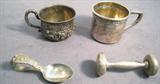 Antique Sterling Mugs, Baby Rattle & Spoon Miniature solid Sterling Silver mug with Repousse border around top, monogrammed "AMH" on front. Made by Gorham Sterling, has some bends and minor surface wear. Measures 2.25" height x 4" from edge to handle.
Small Sterling cup with lovely floral designs round bottom, measures 2" height x 2.5" diameter.
Antique Sterling Silver baby rattle with jingle still inside, monogrammed "DPL" on handle. Measures 3.5" length x 1.25" diameter.
Sterling Silver infant feeding spoon with curved handle, marked and made by "R&B". Measures 3.5" length.
Total Weight: 205.0 grams / 6.590 ozt Tag words: sterl925