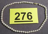 Jewelry 14kt Gold Hand Knotted Pearl Necklace A beautiful 14kt Gold Necklace with genuine pearls. Clasp is marked 14kt Gold. Total Length 15".