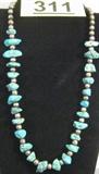 Jewelry Southwestern Style Necklace Beautiful sterling silver, beaded, southwestern style necklace with turquoise nuggets. Measures 11.25" long, total weight: 2.970 ozt.