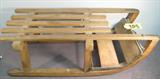 Antique Wooden Children's Toy Snow Sled Great vintage wooden sled with metal railing along bottom of legs, unknown maker but in very nice condition! Would make a great decorative display piece, measures 27" length x 12" width.