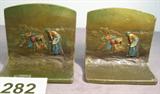 Vintage Metal Bookends By K & O Company Vintage painted metal bookends with 3 ladies working in a field, made by Kronheim and Oldenbusch Company of Brooklyn, New York the company was in business from 1912 - 1943 and produced some of the most colorful and imaginative bookends from grey metal and bronze. There are some paint chips, measures: 5.25" tall.