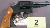 Gun Smith & Wesson Model 10 Vintage Smith & Wesson Model 10. Early firearm with no model # stamped on frame. Very nice condition with a custom high polish reblue done several years ago. Has factory grips and appears to be in good working order. #5885 Smith & Wesson Model 10 in 38 Special Serial Number 469893 Double Action Revolver.
