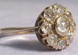 Jewelry 10kt + Yellow Gold Ring with Diamonds Stunning 10kt + yellow gold cluster ring with 9 round diamonds.
Size 7, total weight: 1.8 dwt.