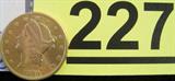 Coin 1900-S Liberty $20 Gold Coin A beautiful United States of America genuine Liberty $20 Gold Coin. (Double Eagle). Coin show beautiful details with some original mint lustre. Has s small streak of glue on the obverse.