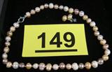 Jewelry Multicolored Pearl Necklace & Earring Set Beautiful set of genuine iridescent multi-colored cultured freshwater pearl necklace and matching stud-back earrings. Hand knotted necklace, earrings measure 9mm - 10mm. Necklace measures 16" length and has 8mm - 9mm pearls.