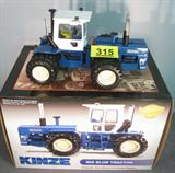 Farm Toy Kinze 640 Big Blue Model Tractor 1:16 scale die-cast Dealer Edition model of "640 Big Blue" toy model tractor, made by Kinze. Comes with original matching box with Serial No. 478. Box reads "featuring two John Deere axles..." "..two Detroit Diesel V-8 engines". In good condition, comes with Certificate of Authenticity. No extra parts or papers included, has been previously displayed in a smoke and pet free home.