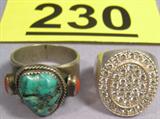 Jewelry Lot of 2 Large Sterling Silver Rings Lot of 2 large sterling silver rings.
Southwestern style ring with large turquoise nugget and 2 small coral stones. Marked Mexico, estimated size 17.
Oval shaped ring with small round CZ's, size 13.
Total weight: 1.210 ozt.