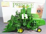 Farm Toy Ertl John Deere "45 Combine" Tractor Die cast model / replica toy tractor. Prestige Collection, John Deere "45" Combine Tractor. Tractor is in excellent condition. Item was previously displayed in a smoke free home, appears to be in original factory box. Original papers or pamphlets are not included.